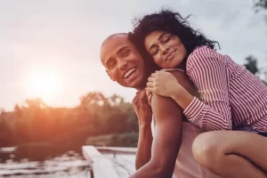 Woman hugging man