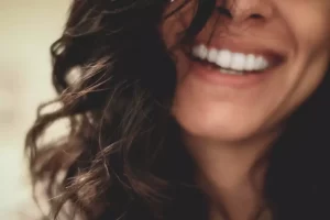 woman with standards smiling